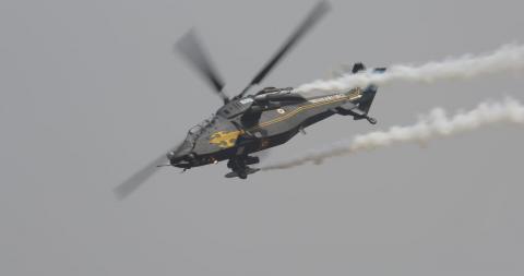 The Indian Air Force's (IAF) Light Combat Helicopter (LCH) performs at the launch of Aero India 2021.